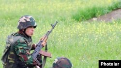 Karabakh Armenian soldiers hold military exercises in the disputed territory.