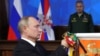 Владимир Путин вручает государственные награды на расширенном заседании коллегии Минобороны 18 декабря 2018