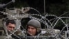 Миротворці НАТО в Косові, грецькі вояки. Митровиця, 2 липня 2010 року
