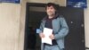 Journalist Vincent Prado outside the specialized administrative court in Aqtau on September 27.