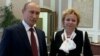 Владимир ва Людмила Путин.