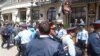 WATCH: Kazakh security forces detained hundreds of journalists, activists, and demonstrators in a number of cities amid a call by the opposition for nationwide demonstrations against changes to Kazakhstan's Land Code. Crowds scattered in Almaty on May 21 as police moved in to make arrests. (RFE/RL's Current Time TV)
