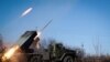 Установка залпового вогню «Град» російських гібридних сил в Горлівці Донецької області, 13 лютого 2015 року