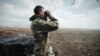 Новолуганський напрямок: на позиціях бойовиків – прапори СРСР та російських військових (відео)