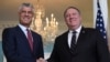 U.S. Secretary of State Mike Pompeo (right) with Kosovar President Hashim Thaci in Washington on November 26.
