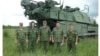 Военнослужащие 53-й зенитно-ракетной бригады на фоне установки "Бук" 