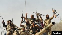 Силы НПС празднуют победу в Сирте