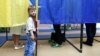 Голосування на одній з виборчих дільниць Києва під час виборів президента України, 25 травня 2014 року